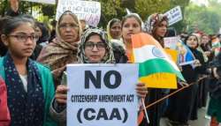 People during a protest against CAA.