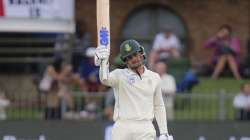 Quinton de Kock of South Africa reaches celebrates reaching a half century, during day two of the third cricket test between South Africa and England in Port Elizabeth