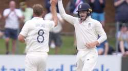 Ollie Pope batsman of England right celebrates with Stuart Board Bowler of England left after taking Keshav Maharaj of South Africa wicket during day four of the third cricket test between South Africa and England in Port Elizabeth