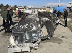 Wreckage of the Ukraine International Airlines Boeing 737-800 at the scene of the crash in Shahedshahr, southwest of the capital Tehran, Iran. (Ukrainian Presidential Press Office via AP)
 