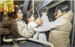 Delhi police detain Jawaharlal Nehru University (JNU) students who were protesting outside the Shast