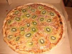 As the photo showed, the standard pizza base was freckled with pepperoni-style kiwi slices.