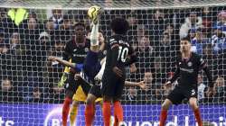 Brighton's Alireza Jahanbakhsh, centre, scores his side's first goal of the game