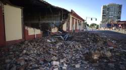 Debris from a collapsed wall of a building litters the ground after an earthquake struck Puerto Rico