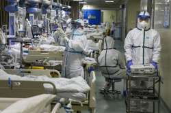 In this Thursday, Feb. 6, 2020, photo, medical workers treat patients in the isolated intensive care unit at a hospital in Wuhan in central China's Hubei province. China's virus death toll have surpassed the number of fatalities in the 2002-03 SARS epidemic, but fewer new cases were reported in a possible sign its spread might be slowing as other nations stepped up efforts to block the disease. (Chinatopix via AP)