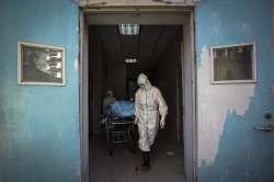 Coronavirus outbreak: China reports 1,886 new coronavirus cases, death toll up by 98