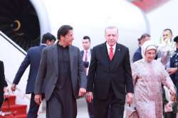 Pakistan PM Imran Khan receives Turkey's President Recep Tayyip Erdogan at the airport during latter's state visit to the south Asian country earlier this month