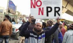 A protestor holds a banner at Jafrabad protest site on Thursday (Facebook)