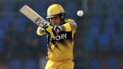 Peshawar Zalmi's Kamran Akmal plays a shot during the Pakistan Super League T20 cricket match between Quetta Gladiators and Peshawar Zalmi at National stadium in Karachi, Pakistan