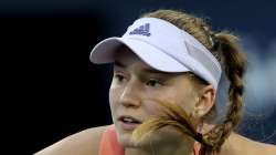 Kazakhstan's Elena Rybakina returns the ball to Croatia's Petra Martic during a semi final match of the Dubai Duty Free Tennis Championship in Dubai, United Arab Emirates