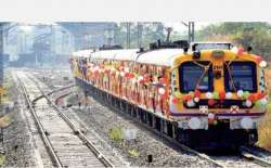 A local train leaves Kharkopar station to Belapur on the new Nerul-Kharkopar suburban corridor in Na