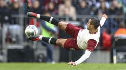 Bayern's Thiago kicks the ball during the German Bundesliga soccer match between FC Bayern Munich and FC Augsburg in Munich, Germany, Sunday