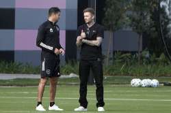 InterMiami co-owner David Beckham, right, talks with head coach Diego Alonso during an MLS training session, Thursday, March 12