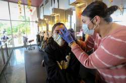 A customer gets her eyebrows waxed at Three-13 Salon, Spa & Boutique on Friday, April 24, 2020, in M