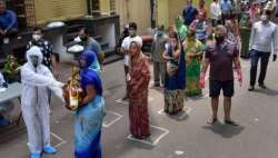 People maintain social-distancing as they pick up groceries (file photo for representational purpose)