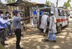 Agartala: An ambulance carries devotees, who had recently attended the religious congregation at Tabligh-e-Jamaat's Markaz in Delhi's Nizamuddin area, for COVID-19 tests, in Agartala, Wednesday, April 1, 2020.