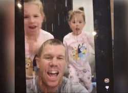 David Warner with daughters