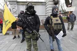 Members of the Boogaloo Movement, attend a demonstration against the lockdown over concern about COV