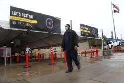 United Auto Workers members leave the Fiat Chrysler Automobiles Warren Truck Plant after the first w