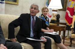 White House coronavirus response coordinator Dr. Deborah Birx listens as director of the National In