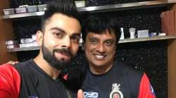 Virat Kohli with Shanker Basu