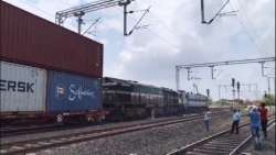 Railways successfully runs double stack container trains in electrified territory