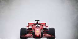 Ferrari driver Sebastian Vettel of Germany steers his car during the second practice session for the Hungarian Formula One Grand Prix at the Hungaroring racetrack in Mogyorod, Hungary, Friday, July 17