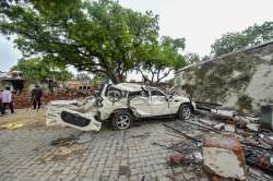 Kanpur: Mangled remains of a car at demolished residence of notorious gangster Vikas Dubey, main accused in Kanpur ambush case, where police security has been deployed, at Bikru village in Kanpur, Friday, July 10, 2020.
Dubey was shot dead by police personnel at Bhauti area today when he allegedly tried to flee while travelling back to Kanpur from Ujjain in Madhya Pradesh.