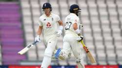 Joe Denly and Rory Burns of England run between the wickets during day one of the 1st #RaiseTheBat Test match at The Ageas Bowl on July 08, 2020 in Southampton, England