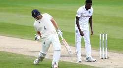 Dom Sibley of England celebrates reaching his century during Day Two of the 2nd Test Match in the #RaiseTheBat Series between England and The West Indies at Emirates Old Trafford on July 17, 2020 in Manc