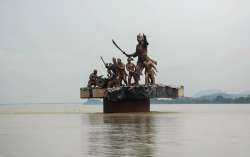 The water level of Brahmaputra River rises to the base of the 1671 Saraighat memorial, as the river swells due to incessant rains, at Machkhowa in Guwahati, Tuesday, July 21, 2020.