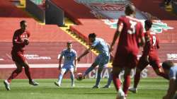 Burnley's Jay Rodriguez, center, shoots and scores his sides first goal during the English Premier League soccer match between Liverpool and Burnley at Anfield.