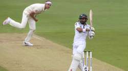 England's Stuart Broad, left, bowls to Pakistan's Mohammad Rizwan, right, during the second day of the second cricket Test match between England and Pakistan, at the Ageas Bowl in Southampton, England