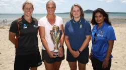 Sophie Devine, Rebecca Rolls, Dane Van Niekerk and Mithali Raj pose on the beach with the ICC Women’s Cricket World Cup during the ICC Women's Cricket World Cup 2021 Venue Announcement at Kohimarama Yacht Club on January 23, 2020 in Auckland