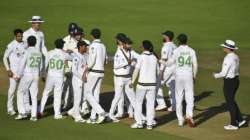 Players of both teams greet each other at the end of the fifth day of the second cricket Test match between England and Pakistan, at the Ageas Bowl in Southampton, England, Monday, Aug. 17