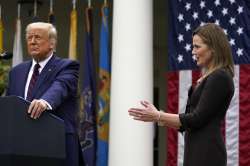  Judge Amy Coney Barrett applauds as President Donald Trump announces Barrett as his nominee to the 