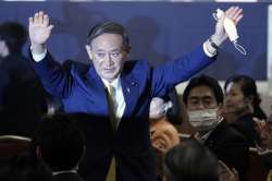 Japanese Chief Cabinet Secretary Yoshihide Suga acknowledges as he is elected as new head of Japan's ruling party at the Liberal Democratic Party's (LDP) leadership election Monday, Sept. 14, 2020, in Tokyo. The ruling LDP chooses its new leader in an internal vote to pick a successor to Prime Minister Shinzo Abe, who announced his intention to resign last month due to illness. (AP Photo/Eugene Hoshiko, Pool)
?