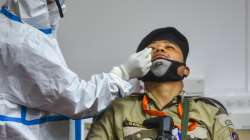 Health workers conduct COVID-19 testing of security personnel, at Vidhan Sabha in New Delhi, Monday,