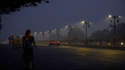 Vehicles ply on Safdarjung flyover, during cold morning, amid hazy weather conditions, in New Delhi, Saturday, Oct 31. Pollution level in the national capital has been recorded in unhealthy category today morning.