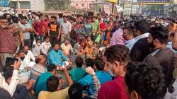 Family members of a girl who was shot dead by Taufeeq, the prime accused, outside her college yesterday, block Ballabhgarh-Sohna road during a protest, at Ballabgarh in Faridabad. 