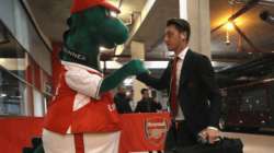 mesut ozil arsenal mascot Gunnersaurus