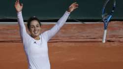 Italy's Martina Trevisan celebrates winning the fourth round match of the French Open tennis tournament against Netherlands' Kiki Bertens in two sets, 6-4, 6-4, at the Roland Garros stadium in Paris, France, Sunday, Oct. 4