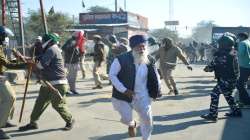 Security personnel and farmers clash as protestors attempt to cross Singhu Border during Delhi Chalo