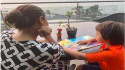 Mom Gauri Khan shares a glimpse of AbRam reading Karan Johar's book, says 'all grown up'