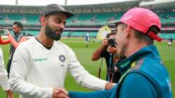 Justin Langer and Virat Kohli