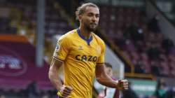 Everton's Dominic Calvert-Lewin celebrates scoring their first goal during the English Premier League soccer match between Burnley and Everton at Turf Moor in Burnley, north west England, Saturday, Dec. 5