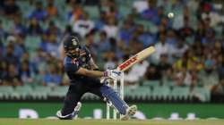 India's captain Virat Kohli hits a six during the second T20 international cricket match between Australia and India at the Sydney Cricket Ground in Sydney, Australia, Sunday, Dec. 6