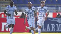 Inter's Nicolo' Barella, right, celebrates after scoring during the Italian Serie A soccer match between Cagliari and Inter Milan at the Sardegna Arena in Cagliari, Italy, Sunday, Dec. 13