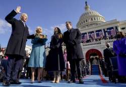 Joe Biden is sworn in as the 46th president of the United States by Chief Justice John Roberts as Jill Biden holds the Bible during the 59th Presidential Inauguration at the U.S. Capitol in Washington, Wednesday, Jan. 20, 2021, as their children Ashley and Hunter watch.(AP Photo/Andrew Harnik, Pool)
 