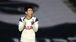 Tottenham's Son Heung-min celebrates after scoring his side's second goal during the English Premier League soccer match between Tottenham Hotspur and Leeds United at Tottenham Hotspur Stadium in London, England, Saturday, Jan. 2